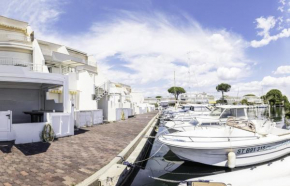 MARINA VUE MER - WIFI- PARKING - PIEDS DANS L'EAU - CoHôteConciergerie Le Grau du Roi La Grande Motte